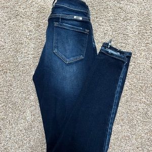 Dark washed blue jeans